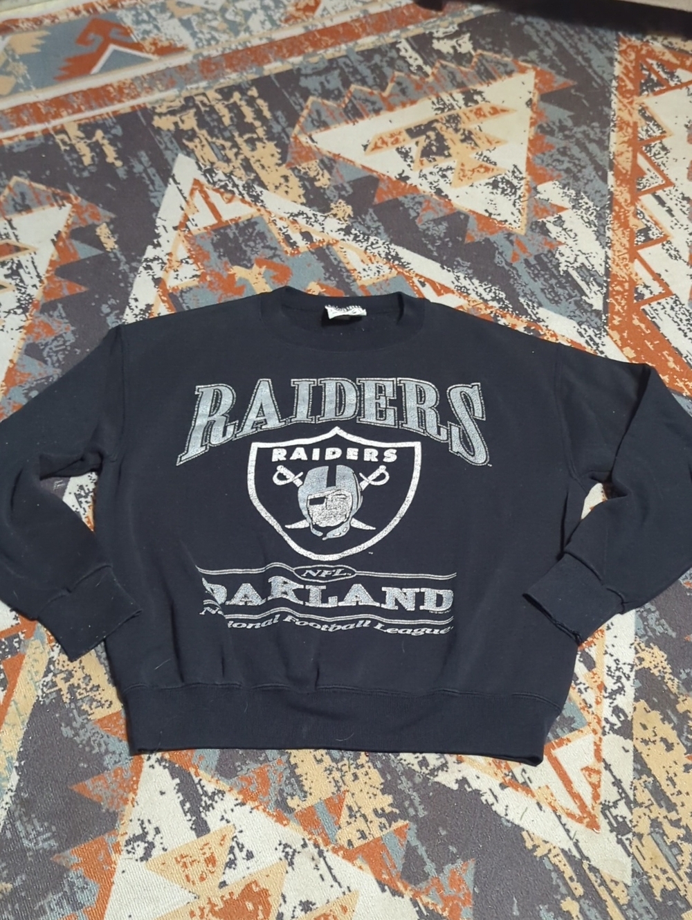 vintage black Lee brand Oakland Raiders crewneck sweatshirt with silver graphics
